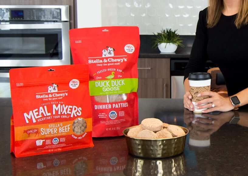 Bowl of freeze dried dinner patties with bag of dinner patties and meal mixers